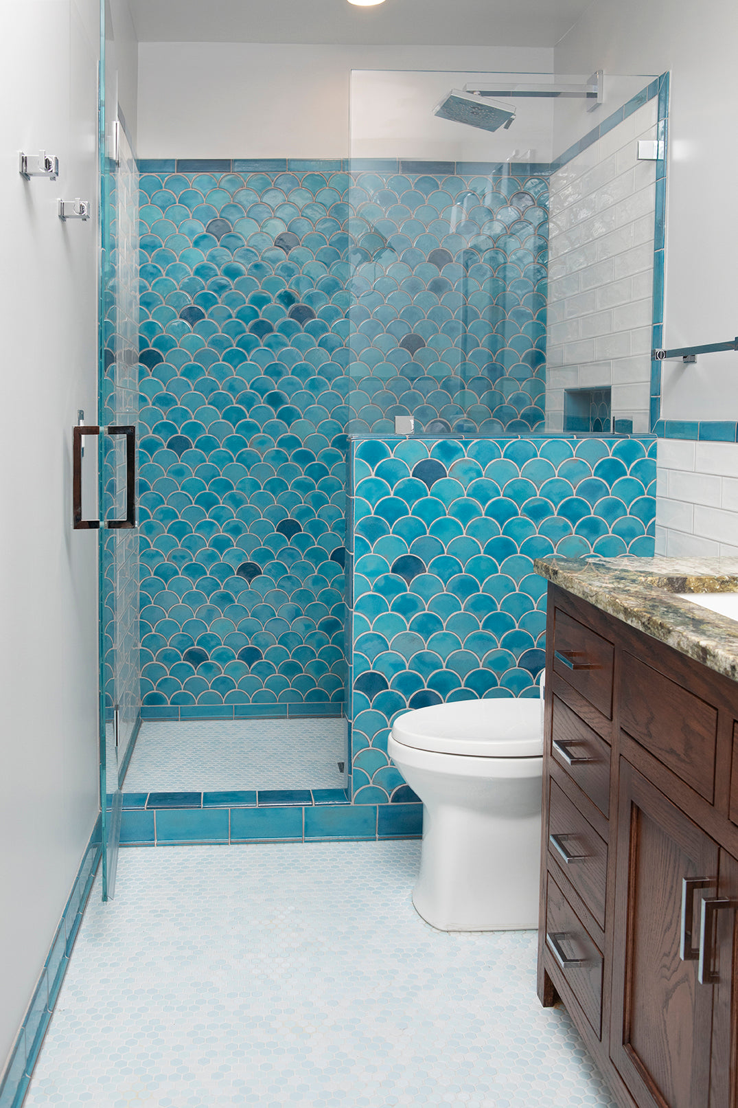 Blue bathroom with peacock shape tiles